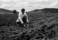 Lesego Makganye cherishing this Braklaagte land. The Setswana word Lefatshe has a wider meaning than the English translation of land. It also means the soil and includes the English concept of earth and country