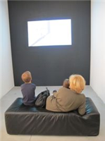 Family view a video at Scope