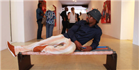 Mishek Masamva reclining on his bench in Venice 2011 