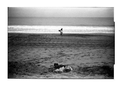 Sleeping man and surfer