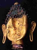 Damaged bronze Buddha